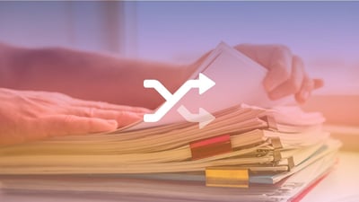 Hands on a stack of documents, with a gradient filter overlay and a shuffle icon