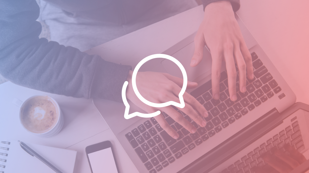 Bird's eye view of hands typing on a keyboard