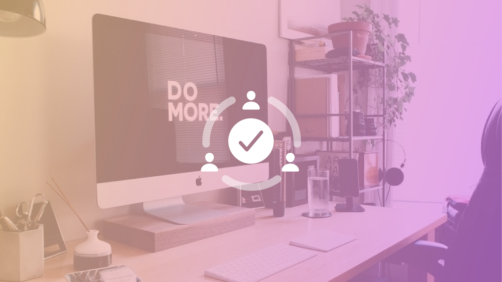 A monitor on a desk, displaying the words 'do more'