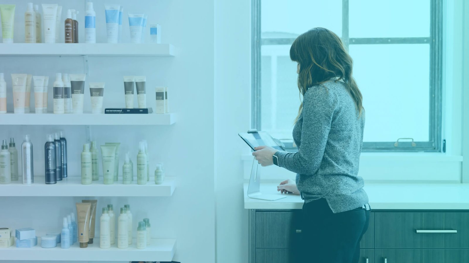 woman working and considering how to franchise her business