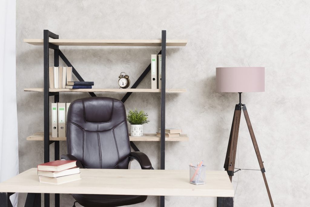 home-office-black-desk-chair-pink-lamp-minimalist-shelf